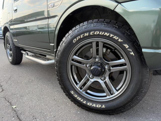 ジムニー ランドベンチャー パナソニックSDナビ フルセグTV バックモニター 革巻きステアリング ハーフレザーシート 運転席シートヒーター ETC車載器 サイドステップ LEDウィンカーミラー 純正16インチAW スペアタイヤ(40枚目)