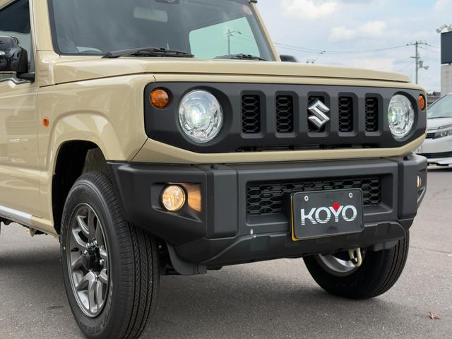 ジムニー XC 届出済未使用車 オーディオレス 革巻きステアリング 前席シートヒーター スズキセーフティサポート オートライト クルーズコントロール 純正LEDヘッドライト 純正フォグランプ 純正16インチAW(32枚目)