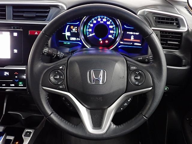 フィットハイブリッド Ｌパッケージ　ナビ・フルセグ・バックカメラ・クルーズコントロール・ＥＴＣ・ＨＩＤライト・１５ＡＷ　ナビ＆ＴＶ　地デジフルセグＴＶ　ＵＳＢ　ＥＣＯＮ　オートクルーズコントロール　イモビライザー　ＥＳＣ　ＡＢＳ（6枚目）