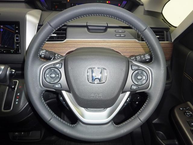 フリード クロスター・ホンダセンシング 両PSD 地デジ エアバック Iストップ VSA リヤカメラ 3列シート DVD再生 イモビライザー キーフリー パワステ クルコン AAC LEDライト シートヒータ(7枚目)