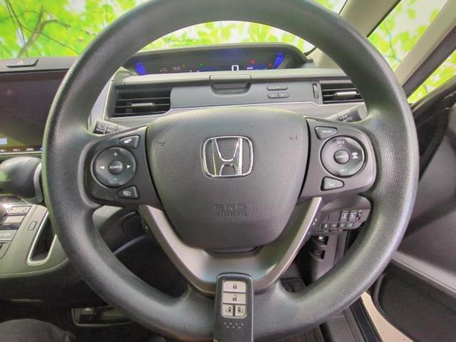 フリード Ｇブラックスタイル　新品タイヤ／保証書／純正　９インチ　メモリーナビ／ホンダセンシング／両側電動スライドドア／シートヒーター　前席／車線逸脱防止支援システム／パーキングアシスト　バックガイド　衝突被害軽減システム　禁煙車（16枚目）