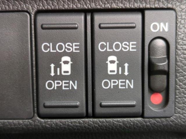 フリード Ｇブラックスタイル　新品タイヤ／保証書／純正　９インチ　メモリーナビ／ホンダセンシング／両側電動スライドドア／シートヒーター　前席／車線逸脱防止支援システム／パーキングアシスト　バックガイド　衝突被害軽減システム　禁煙車（32枚目）