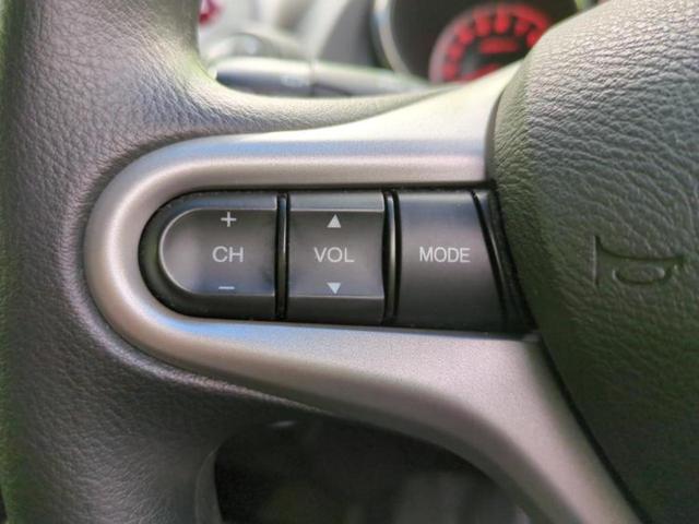 フィット １３Ｇ・スマートセレクションファインスタイル　保証書／社外　ＨＤＤナビ／ＥＴＣ／ＥＢＤ付ＡＢＳ／バックモニター／フルセグＴＶ／ＤＶＤ／禁煙車／エアバッグ　運転席／エアバッグ　助手席／パワーウインドウ／キーレスエントリー／オートエアコン　ＤＶＤ再生（29枚目）