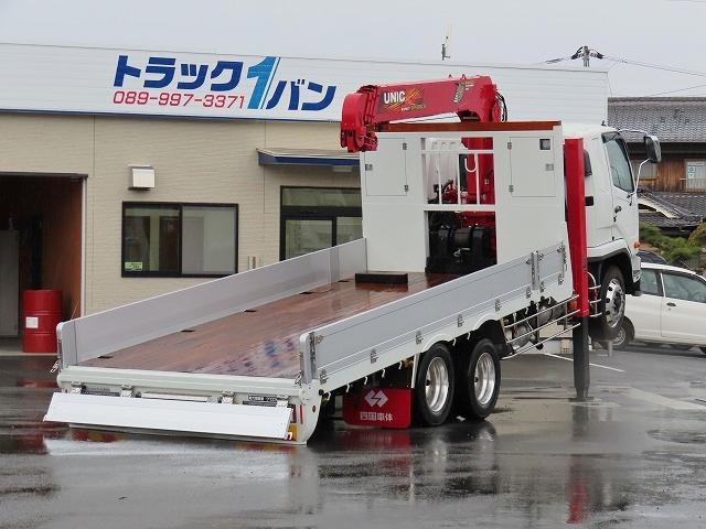 ファイター ９．７ｔ　増トンワイド低床２デフ　クレーン付ハイジャッキ　内寸－長５９７／幅２３５／高３７・ユニック・四国車体・床板・内フック５対・４段クレーン・ラジコン・フックイン・２．９３ｔ吊り・自動張出・格納ジャッキ・アルミブロック・アオリ５方開・２７０馬力ターボ（10枚目）