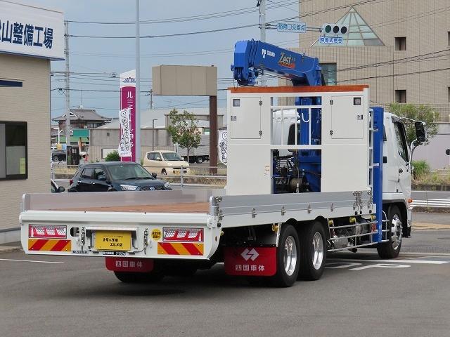 ファイター ９．７ｔ　増トンワイド　クレーン付セルフ　内寸－長６４７／幅２３５／高２０・タダノ・床板・内フック５対・４段クレーン・ラジコン・フックイン・２．９３ｔ吊り・ＭＬ警報型・自動張出・格納ジャッキ・アオリ４方開・ウインチ・歩み掛け・２７０馬力ターボ（2枚目）