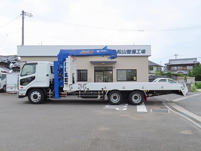 ファイター ９．７ｔ　増トンワイド　クレーン付セルフ　内寸－長６４７／幅２３５／高２０・タダノ・床板・内フック５対・４段クレーン・ラジコン・フックイン・２．９３ｔ吊り・ＭＬ警報型・自動張出・格納ジャッキ・アオリ４方開・ウインチ・歩み掛け・２７０馬力ターボ（3枚目）