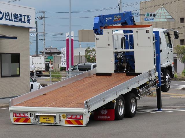 ファイター ９．７ｔ　増トンワイド　クレーン付セルフ　内寸－長６４７／幅２３５／高２０・タダノ・床板・内フック５対・４段クレーン・ラジコン・フックイン・２．９３ｔ吊り・ＭＬ警報型・自動張出・格納ジャッキ・アオリ４方開・ウインチ・歩み掛け・２７０馬力ターボ（8枚目）
