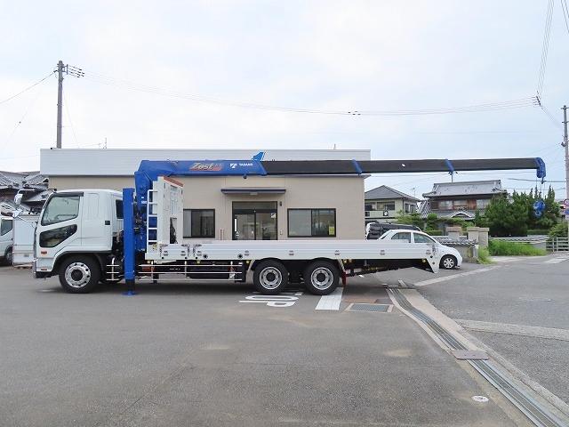 ファイター ９．７ｔ　増トンワイド　クレーン付セルフ　内寸－長６４７／幅２３５／高２０・タダノ・床板・内フック５対・４段クレーン・ラジコン・フックイン・２．９３ｔ吊り・ＭＬ警報型・自動張出・格納ジャッキ・アオリ４方開・ウインチ・歩み掛け・２７０馬力ターボ（10枚目）