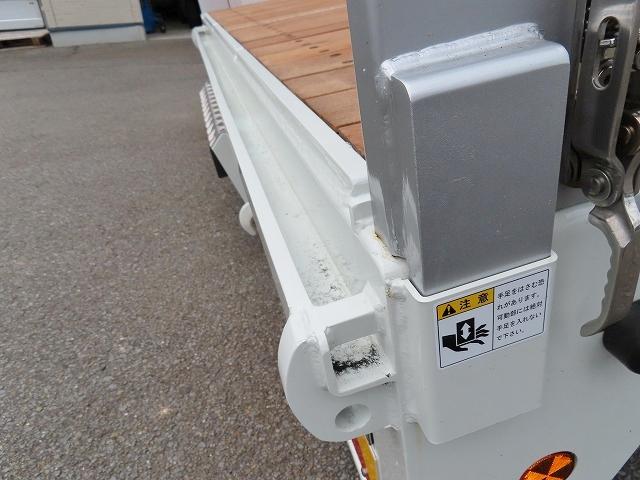 ファイター ９．７ｔ　増トンワイド　クレーン付セルフ　内寸－長６４７／幅２３５／高２０・タダノ・床板・内フック５対・４段クレーン・ラジコン・フックイン・２．９３ｔ吊り・ＭＬ警報型・自動張出・格納ジャッキ・アオリ４方開・ウインチ・歩み掛け・２７０馬力ターボ（37枚目）