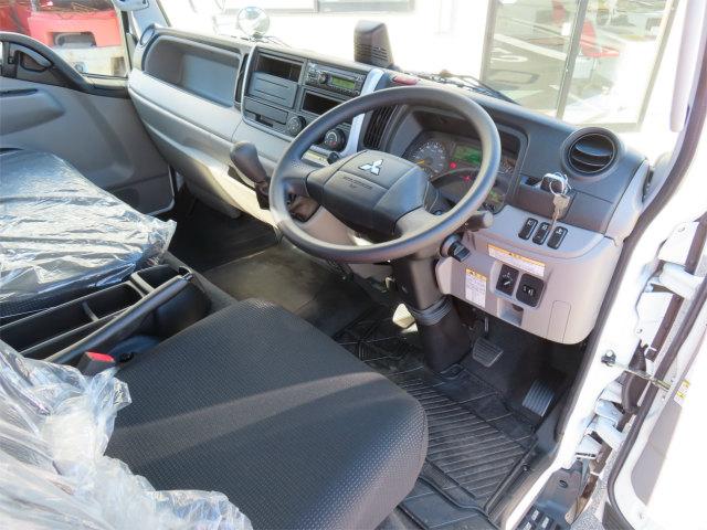 キャンター 3t ワイドロング 6段ラジコンフックイン 内寸-長370/幅207/高37・タダノ・床板・2.93t吊り・ML(モーメントリミッター)警報型・差違いジャッキ・リアジャッキ・アオリ3方開・セイコーラック付・150馬力ターボ(11枚目)