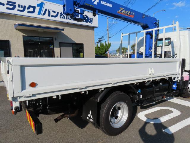 キャンター 3.35t ワイドロング 4段ラジコンフックイン 内寸-長370/幅207/高37・タダノ・2.93t吊り・床板・ML(モーメントリミッター)警報型・差違いジャッキ・アオリ3方開・セイコーラック付・液晶メーター・150馬力ターボ(33枚目)