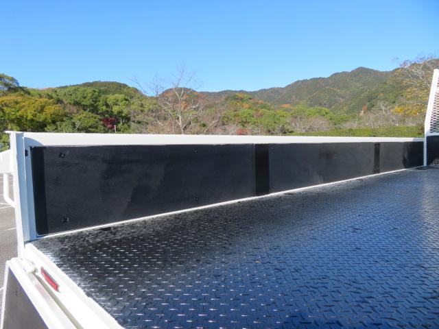 ダイナトラック ２．９５ｔ　ワイド超々ロング　５段ラジコンフックイン　内寸－長４８５／幅２１０／高３８・ユニック・床縞鉄・内フック２対・２．９３ｔ吊り・差違いジャッキ・アオリ３方開・セイコーラック付・１８０馬力ターボ（27枚目）