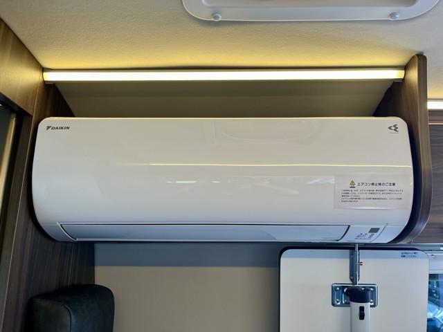ハイエースバン レクビィ　カントリークラブ　リチウム４００Ａｈ　家庭用エアコン　ソーラーパネル　ＦＦヒーター　マルチルーム　シャワー　温水ボイラー　１９インチテレビ　冷蔵庫　電子レンジ　２段ベッド　マックスファン　モデリスタエアロ　全方位カメラ（52枚目）