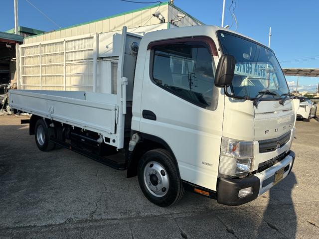 キャンター 　２９９０ｃｃ　２ｔ　２トン　ワイドロング　平ボディ　荷台全面鉄板張り　内外装仕上げ済み　５速　５ＭＴ　３ペダル　パワーウインドウ　３人乗り　ロング（4枚目）