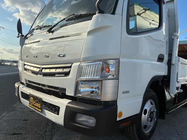 キャンター 　２９９０ｃｃ　２ｔ　２トン　ワイドロング　平ボディ　荷台全面鉄板張り　内外装仕上げ済み　５速　５ＭＴ　３ペダル　パワーウインドウ　３人乗り　ロング（9枚目）