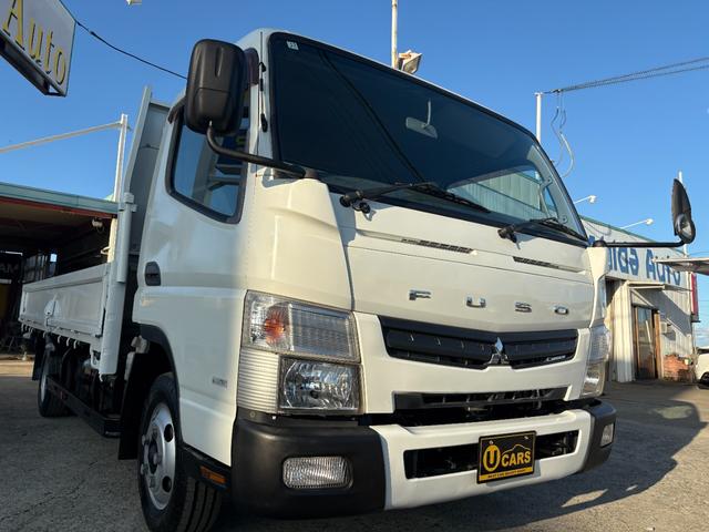 キャンター 　２９９０ｃｃ　２ｔ　２トン　ワイドロング　平ボディ　荷台全面鉄板張り　内外装仕上げ済み　５速　５ＭＴ　３ペダル　パワーウインドウ　３人乗り　ロング（12枚目）