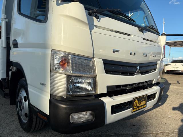 キャンター 　２９９０ｃｃ　２ｔ　２トン　ワイドロング　平ボディ　荷台全面鉄板張り　内外装仕上げ済み　５速　５ＭＴ　３ペダル　パワーウインドウ　３人乗り　ロング（13枚目）