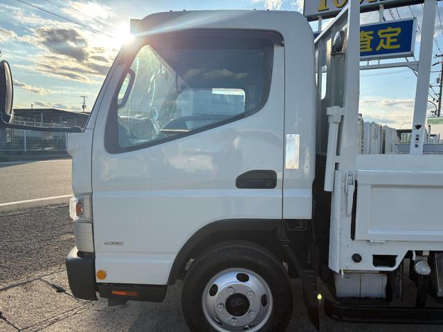 キャンター 　２９９０ｃｃ　２ｔ　２トン　ワイドロング　平ボディ　荷台全面鉄板張り　内外装仕上げ済み　５速　５ＭＴ　３ペダル　パワーウインドウ　３人乗り　ロング（16枚目）