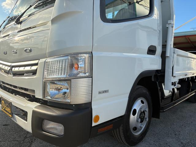 キャンター 　２９９０ｃｃ　２ｔ　２トン　ワイドロング　平ボディ　荷台全面鉄板張り　内外装仕上げ済み　５速　５ＭＴ　３ペダル　パワーウインドウ　３人乗り　ロング（18枚目）