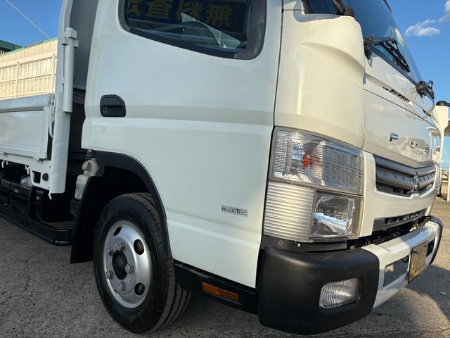 キャンター 　２９９０ｃｃ　２ｔ　２トン　ワイドロング　平ボディ　荷台全面鉄板張り　内外装仕上げ済み　５速　５ＭＴ　３ペダル　パワーウインドウ　３人乗り　ロング（21枚目）