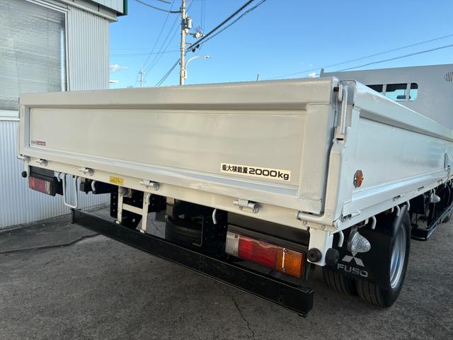 キャンター 　２９９０ｃｃ　２ｔ　２トン　ワイドロング　平ボディ　荷台全面鉄板張り　内外装仕上げ済み　５速　５ＭＴ　３ペダル　パワーウインドウ　３人乗り　ロング（31枚目）