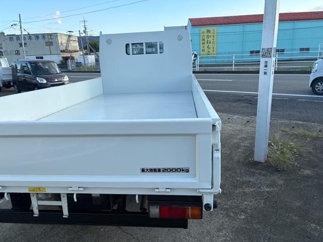 キャンター 　２９９０ｃｃ　２ｔ　２トン　ワイドロング　平ボディ　荷台全面鉄板張り　内外装仕上げ済み　５速　５ＭＴ　３ペダル　パワーウインドウ　３人乗り　ロング（43枚目）
