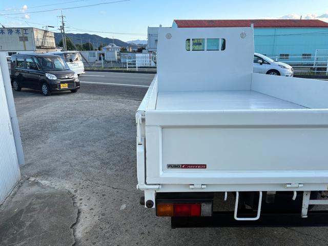 キャンター 　２９９０ｃｃ　２ｔ　２トン　ワイドロング　平ボディ　荷台全面鉄板張り　内外装仕上げ済み　５速　５ＭＴ　３ペダル　パワーウインドウ　３人乗り　ロング（44枚目）