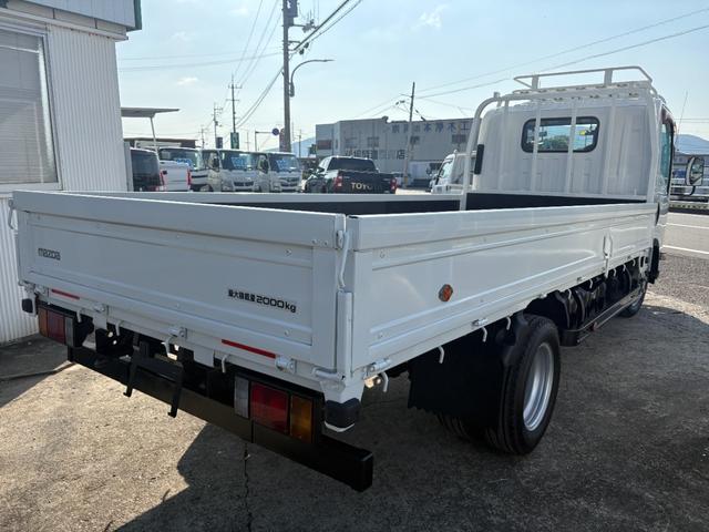 タイタントラック  2990cc 2t平ボディ 2トン ワイドロング パワーウインドウ 走行54000K 5速 5MT 荷台内寸437×180 内外装仕上げ済み(3枚目)