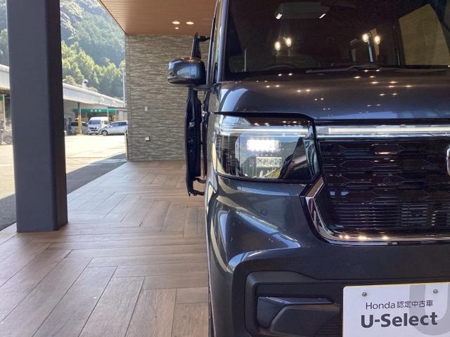 N-BOXカスタム ターボ 純正ナビ ETC フロントドラレコ リヤ席モニター 両側電動スライドドア 本革巻きステアリング パドルシフト フロントシートヒーターシートバックテーブル オートリトラミラー タバコ臭有(10枚目)