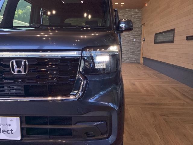 N-BOXカスタム ターボ 純正ナビ ETC フロントドラレコ リヤ席モニター 両側電動スライドドア 本革巻きステアリング パドルシフト フロントシートヒーターシートバックテーブル オートリトラミラー タバコ臭有(11枚目)