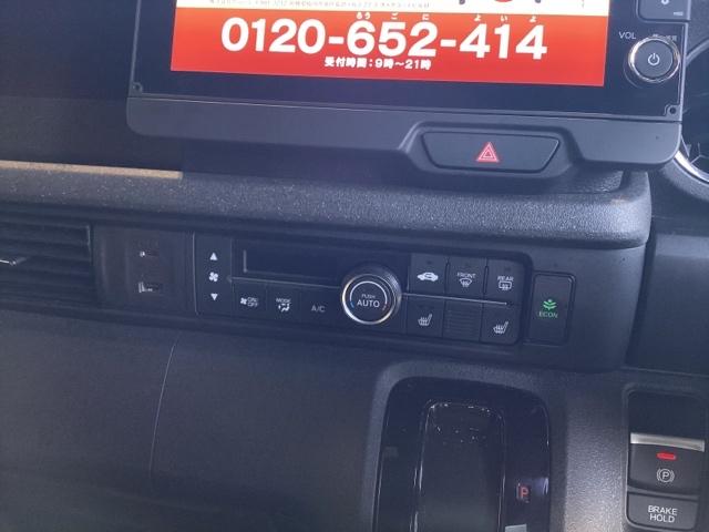 N-BOXカスタム ターボ 純正ナビ ETC フロントドラレコ リヤ席モニター 両側電動スライドドア 本革巻きステアリング パドルシフト フロントシートヒーターシートバックテーブル オートリトラミラー タバコ臭有(17枚目)