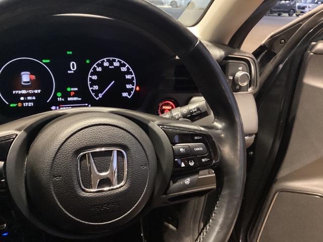 ヴェゼル ｅ：ＨＥＶＺ　純正ナビ　ＥＴＣ　前後ドラレコ　地デジ　フロントシートヒーター熱線入りフロントウィンド―　ハンズフリーパワーテールゲートＬＥＤシーケンシャルターンシグナルランプ　１８インチアルミホイル（12枚目）