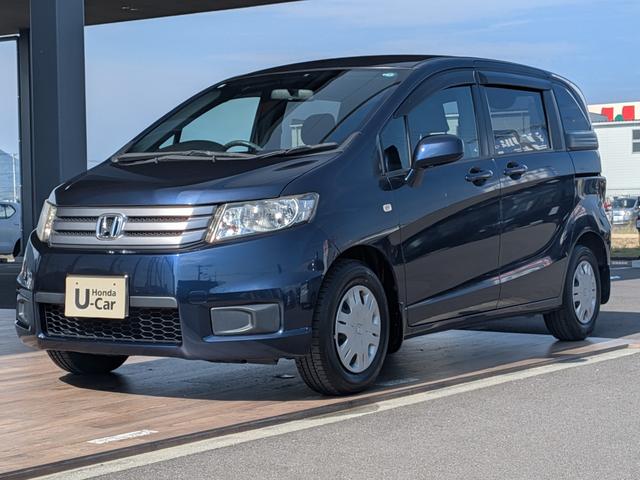 フリードスパイク Ｇ　ジャストセレクション　ギャザーズナビ　バックモニターカメラ　両側スライドドア　ＨＩＤヘッドライト　キーレス　ＥＴＣ　ＣＤ　オートエアコン　５人乗り　ＣＶＴ（3枚目）