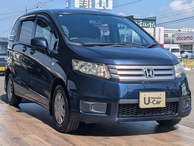 フリードスパイク Ｇ　ジャストセレクション　ギャザーズナビ　バックモニターカメラ　両側スライドドア　ＨＩＤヘッドライト　キーレス　ＥＴＣ　ＣＤ　オートエアコン　５人乗り　ＣＶＴ（5枚目）