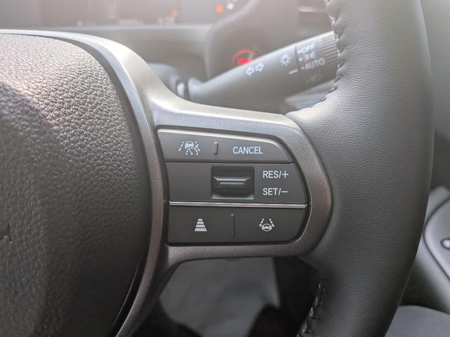 フリード ｅ：ＨＥＶエアー　ＥＸ　６人　新車未登録車　両側パワースライドドア　アダプティブクルーズコントロール　ホンダセンシング　マルチビューカメラシステム　ブラインドスポットインフォメーション　２列目キャプテンシート　シートヒーター（35枚目）