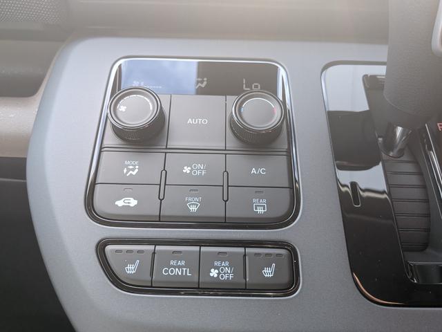 フリード ｅ：ＨＥＶエアー　ＥＸ　６人　新車未登録車　両側パワースライドドア　アダプティブクルーズコントロール　ホンダセンシング　マルチビューカメラシステム　ブラインドスポットインフォメーション　２列目キャプテンシート　シートヒーター（42枚目）