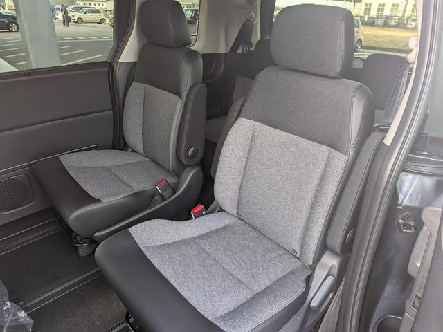 フリード ｅ：ＨＥＶエアー　ＥＸ　６人　新車未登録車　両側パワースライドドア　アダプティブクルーズコントロール　ホンダセンシング　マルチビューカメラシステム　ブラインドスポットインフォメーション　２列目キャプテンシート　シートヒーター（55枚目）