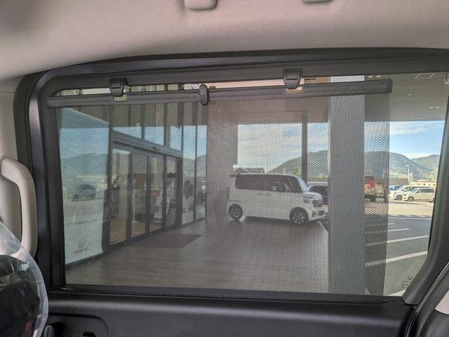 フリード ｅ：ＨＥＶエアー　ＥＸ　６人　新車未登録車　両側パワースライドドア　アダプティブクルーズコントロール　ホンダセンシング　マルチビューカメラシステム　ブラインドスポットインフォメーション　２列目キャプテンシート　シートヒーター（59枚目）