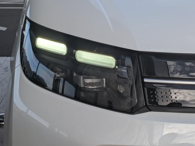 フリード ｅ：ＨＥＶエアー　６人乗り　新車未登録車　ホンダセンシング　ブラインドスポットインフォメーション　後退出庫サポート　２列目キャプテンシート　コンビシート　シートヒーター　電子パーキング　両側パワースライドドア（12枚目）