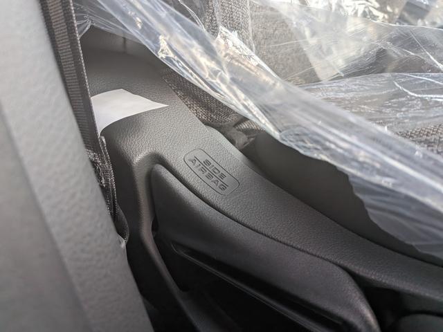 フリード ｅ：ＨＥＶエアー　６人乗り　新車未登録車　ホンダセンシング　ブラインドスポットインフォメーション　後退出庫サポート　２列目キャプテンシート　コンビシート　シートヒーター　電子パーキング　両側パワースライドドア（29枚目）