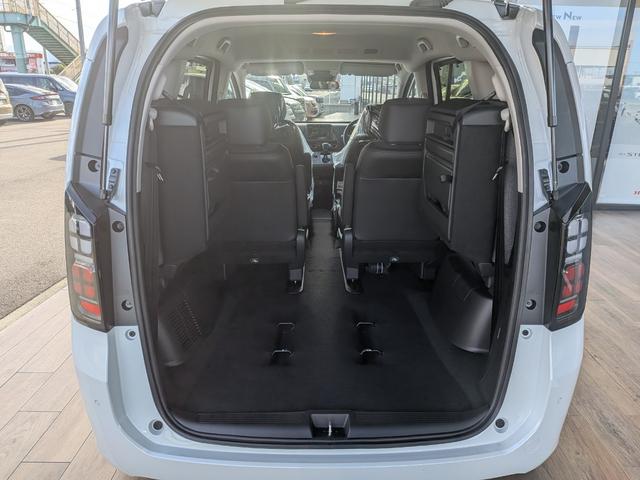 フリード ｅ：ＨＥＶエアー　６人乗り　新車未登録車　ホンダセンシング　ブラインドスポットインフォメーション　後退出庫サポート　２列目キャプテンシート　コンビシート　シートヒーター　電子パーキング　両側パワースライドドア（47枚目）