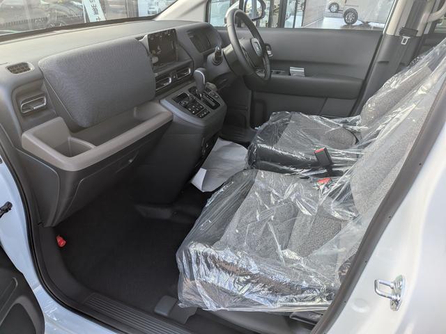 フリード ｅ：ＨＥＶエアー　６人乗り　新車未登録車　ホンダセンシング　ブラインドスポットインフォメーション　後退出庫サポート　２列目キャプテンシート　コンビシート　シートヒーター　電子パーキング　両側パワースライドドア（53枚目）