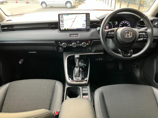 ヴェゼル ｅ：ＨＥＶ　Ｚ　ホンダセンシング　ナビ　バックモニター　Ｂｌｕｅｔｏｏｔｈ　フルセグＴＶ　ブラインドスポットインフォメーション　シートヒーター　パドルシフト　ステアリングヒーター　ＥＴＣ　１８インチＡＷ　コンビシート（2枚目）