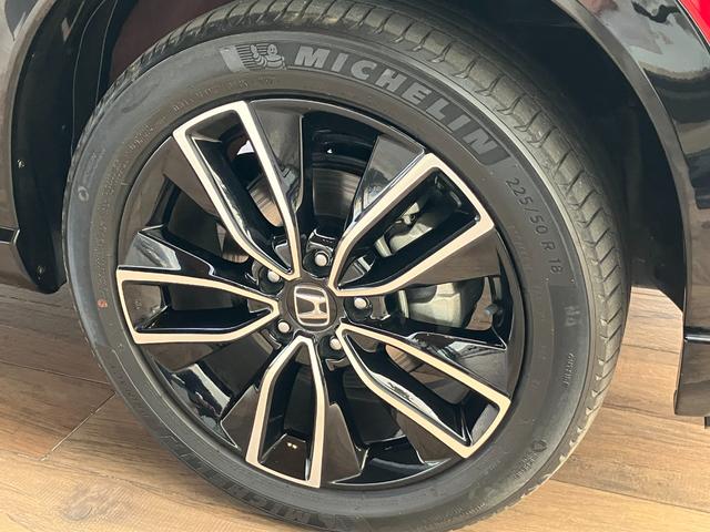 ヴェゼル ｅ：ＨＥＶ　Ｚ　ホンダセンシング　ナビ　バックモニター　Ｂｌｕｅｔｏｏｔｈ　フルセグＴＶ　ブラインドスポットインフォメーション　シートヒーター　パドルシフト　ステアリングヒーター　ＥＴＣ　１８インチＡＷ　コンビシート（8枚目）