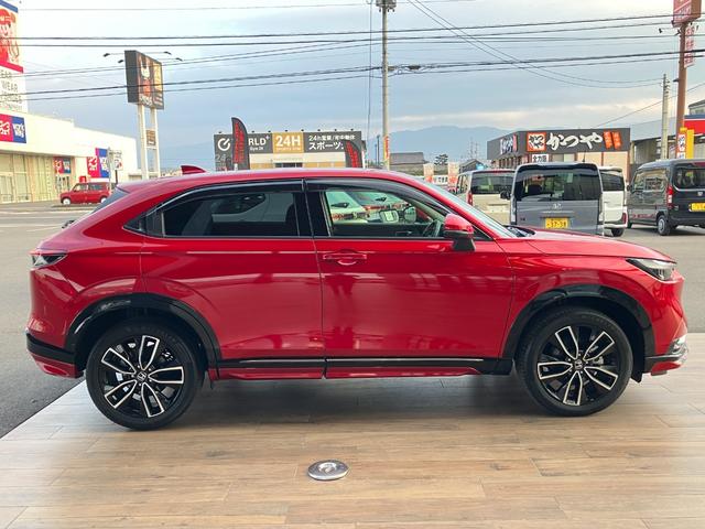 ヴェゼル ｅ：ＨＥＶ　Ｚ　ホンダセンシング　ナビ　バックモニター　Ｂｌｕｅｔｏｏｔｈ　フルセグＴＶ　ブラインドスポットインフォメーション　シートヒーター　パドルシフト　ステアリングヒーター　ＥＴＣ　１８インチＡＷ　コンビシート（10枚目）