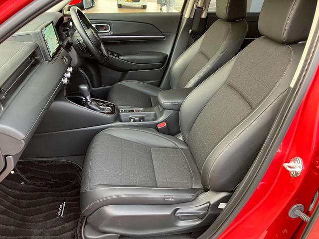 ヴェゼル ｅ：ＨＥＶ　Ｚ　ホンダセンシング　ナビ　バックモニター　Ｂｌｕｅｔｏｏｔｈ　フルセグＴＶ　ブラインドスポットインフォメーション　シートヒーター　パドルシフト　ステアリングヒーター　ＥＴＣ　１８インチＡＷ　コンビシート（20枚目）