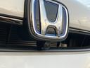フィット ｅ：ＨＥＶホーム　ブラックスタイル　ホンダセンシング　マルチビューカメラシステム　ナビ　ＴＶ　ブラインドスポットインフォメーション／後退出庫サポート　ＬＥＤヘッドライト　ＥＴＣ２．０　Ｂｌｕｅｔｏｏｔｈ　ＢＬＡＣＫ　ＳＴＹＬＥ専用装備（7枚目）