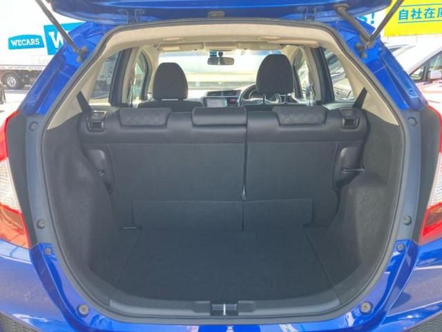 フィット 13G・Fパッケージ 純正 SDナビ/EBD付ABS/横滑り防止装置/アイドリングストップ/エアバッグ 運転席/エアバッグ 助手席/アルミホイール 社外 14インチ/パワーウインドウ/キーレスエントリー 盗難防止装置(8枚目)