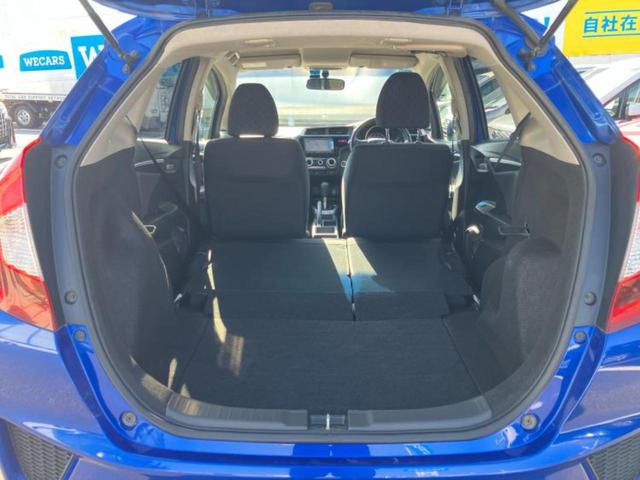 フィット 13G・Fパッケージ 純正 SDナビ/EBD付ABS/横滑り防止装置/アイドリングストップ/エアバッグ 運転席/エアバッグ 助手席/アルミホイール 社外 14インチ/パワーウインドウ/キーレスエントリー 盗難防止装置(19枚目)