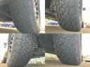 ４ＷＤ　Ｄパワーパッケージ　新品タイヤ／社外　ナビ／フリップダウンモニター　社外　１０．１インチ／シートヒーター／ＥＢＤ付ＡＢＳ／横滑り防止装置／フルセグＴＶ／エアバッグ　運転席／エアバッグ　助手席／ＭＴモード付き　後席モニター（53枚目）